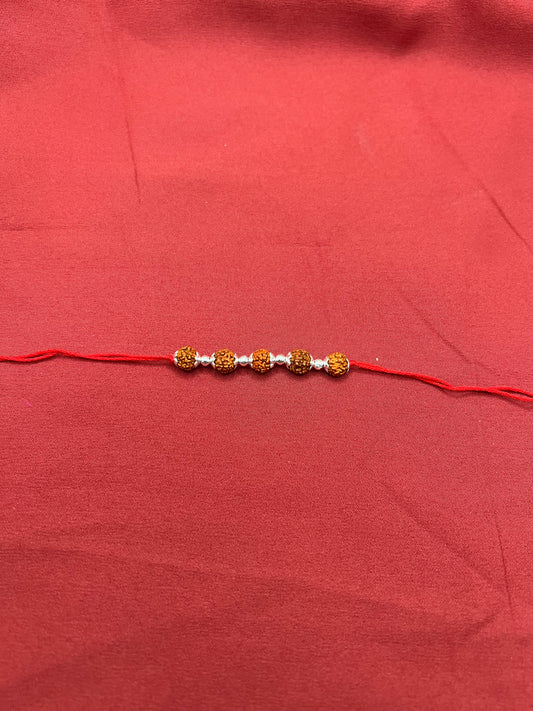 Silver Rudraksh Rakhi - Avika jewels